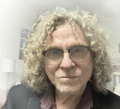 Professional headshot or promotional image of Graeme Daniels, licensed Marriage and Family Therapist (MFT).